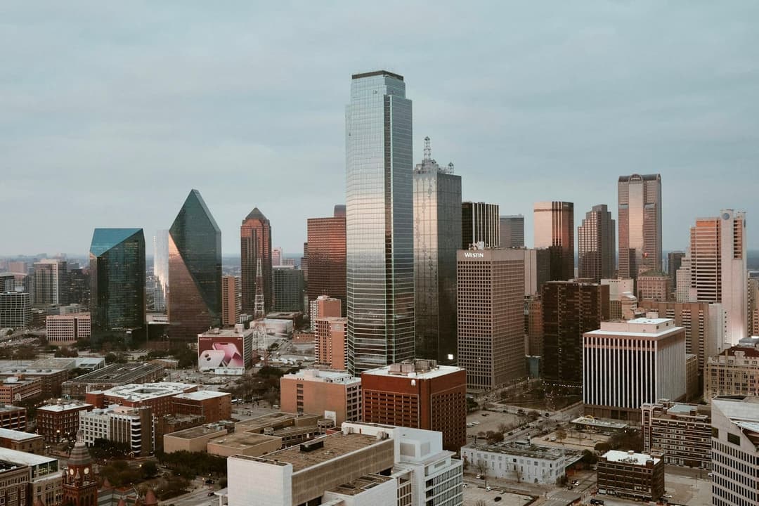 Downtown Dallas under a daytime sky